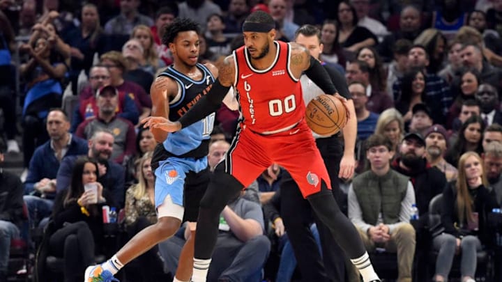 CLEVELAND, OHIO - NOVEMBER 23: Carmelo Anthony #00 of the Portland Trail Blazers posts up against Darius Garland #10 of the Cleveland Cavaliers during the first half at Rocket Mortgage Fieldhouse on November 23, 2019 in Cleveland, Ohio. NOTE TO USER: User expressly acknowledges and agrees that, by downloading and/or using this photograph, user is consenting to the terms and conditions of the Getty Images License Agreement. (Photo by Jason Miller/Getty Images)