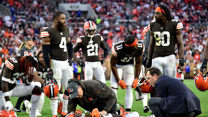 CLEVELAND, OHIO – OCTOBER 17: Kareem Hunt #27 of the Cleveland Browns is tended to by team medical personnel after an injury during the fourth quarter against the Arizona Cardinals at FirstEnergy Stadium on October 17, 2021 in Cleveland, Ohio. (Photo by Jason Miller/Getty Images)