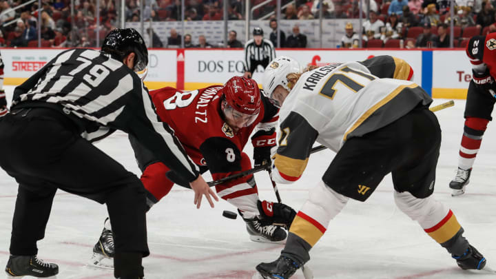 GLENDALE, AZ – OCTOBER 10: Arizona Coyotes center Nick Schmaltz (8) and Vegas Golden Knights center William Karlsson (71) face off during the NHL hockey game between the Vegas Golden Knights and the Arizona Coyotes on October 10, 2019 at Gila River Arena in Glendale, Arizona. (Photo by Kevin Abele/Icon Sportswire via Getty Images)