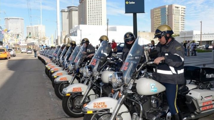 Feb 1, 2013; New Orleans, LA, USA; Louisiana state police on motorcycles patrol Convention Center Blvd. in advance of Super Bowl XLVII between the Baltimore Ravens and San Francisco 49ers. Mandatory Credit: Kirby Lee-USA TODAY Sports