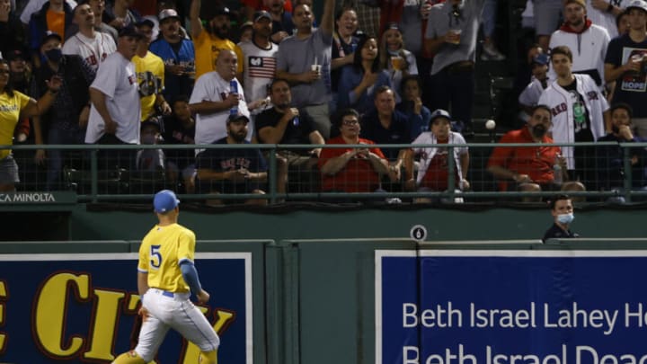 Sep 24, 2021; Boston, Massachusetts, USA; Boston Red Sox center fielder Enrique Hernandez (5) watches as a ball hit by New York Yankees designated hitter Giancarlo Stanton (27) clears the fence for a three run home run during the third inning at Fenway Park. Mandatory Credit: Winslow Townson-USA TODAY Sports