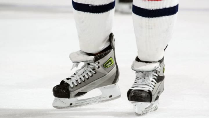 UNIONDALE, NY - DECEMBER 23: A Columbus Blue Jackets player skates on the ice against the New York Islanders at Nassau Coliseum on December 23, 2006 in Uniondale, New York. The Islanders won 4-0. (Photo by Bruce Bennett/Getty Images)