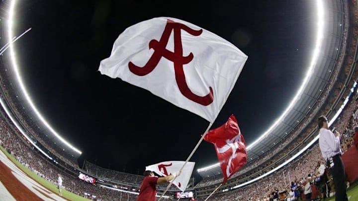 Oct 1, 2016; Tuscaloosa, AL, USA; Alabama Crimson Tide cheerleaders fly the flags after their team scored against the Kentucky Wildcats at Bryant-Denny Stadium. The Crimson Tide defeated Kentucky 34-6. Mandatory Credit: Marvin Gentry-USA TODAY Sports