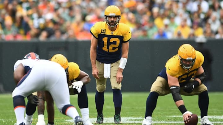 GREEN BAY, WISCONSIN - SEPTEMBER 22: Aaron Rodgers #12 of the Green Bay Packers waits for the snap during the first half against the Denver Broncos at Lambeau Field on September 22, 2019 in Green Bay, Wisconsin. (Photo by Stacy Revere/Getty Images)
