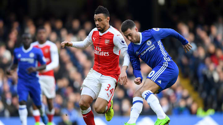 LONDON, ENGLAND - FEBRUARY 04: Eden Hazard of Chelsea battles for the ball with Francis Coquelin of Arsenal during the Premier League match between Chelsea and Arsenal at Stamford Bridge on February 4, 2017 in London, England. (Photo by Mike Hewitt/Getty Images)