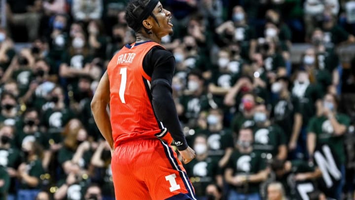 Illinois’ Trent Frazier celebrates after hitting a 3-pointer against Michigan State with seconds left in the second half on Saturday, Feb. 19, 2022, at the Breslin Center in East Lansing.220219 Msu Illinois 226a