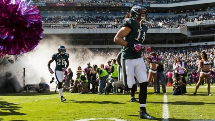 Oct 20, 2013; Philadelphia, PA, USA; The Philadelphia Eagles including wide receiver Riley Cooper (14) enter the field prior to playing the Dallas Cowboys at Lincoln Financial Field. The Cowboys defeated the Eagles 17-3. Mandatory Credit: Howard Smith-USA TODAY Sports