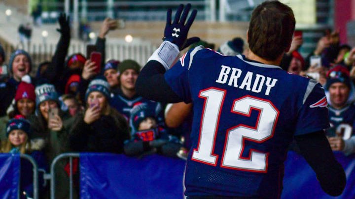 FOXBOROUGH, MASSACHUSETTS - DECEMBER 30: Tom Brady #12 of the New England Patriots runs off the field after a game against the New York Jets at Gillette Stadium on December 30, 2018 in Foxborough, Massachusetts. (Photo by Billie Weiss/Getty Images)