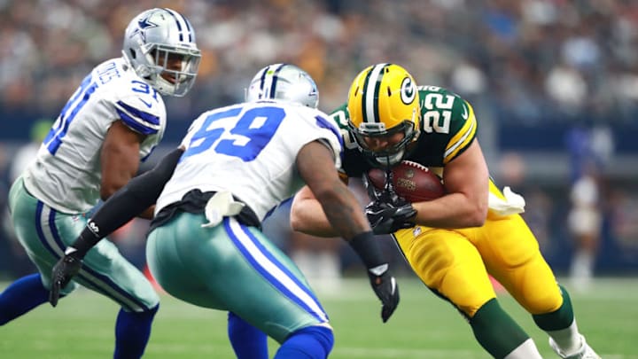 ARLINGTON, TX - OCTOBER 08: Byron Jones #31 of the Dallas Cowboys and Anthony Hitchens #59 of the Dallas Cowboys close in on Aaron Ripkowski #22 of the Green Bay Packers in the second half of a foot ball game at AT&T Stadium on October 8, 2017 in Arlington, Texas. (Photo by Tom Pennington/Getty Images)