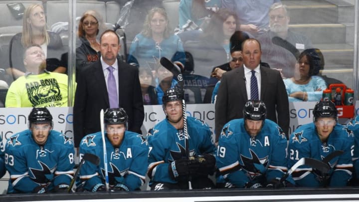 SAN JOSE, CA - SEPTEMBER 25: Head coach Peter DeBoer and Assistant coach Steve Spott of the San Jose Sharks coach against the Arizona Coyotes at SAP Center on September 25, 2015 in San Jose, California. (Photo by Rocky W. Widner/NHL/Getty Images)
