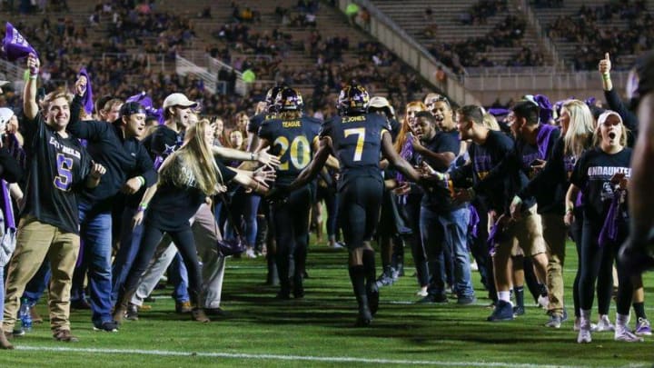 Nov 19, 2016; Greenville, NC, USA; East Carolina Pirates wide receiver Zay Jones (7) runs past a tunnel of fans before the start of the second half against the Navy Midshipmen at Dowdy-Ficklen Stadium. Navy defeated East Carolina 66-31. Mandatory Credit: James Guillory-USA TODAY Sports