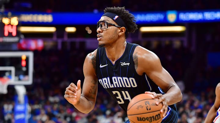 ORLANDO, FLORIDA – MARCH 13: Wendell Carter Jr. #34 of the Orlando Magic drives to the basket in the third quarter against the Philadelphia 76ers at Amway Center on March 13, 2022 in Orlando, Florida. NOTE TO USER: User expressly acknowledges and agrees that, by downloading and or using this photograph, User is consenting to the terms and conditions of the Getty Images License Agreement. (Photo by Julio Aguilar/Getty Images)