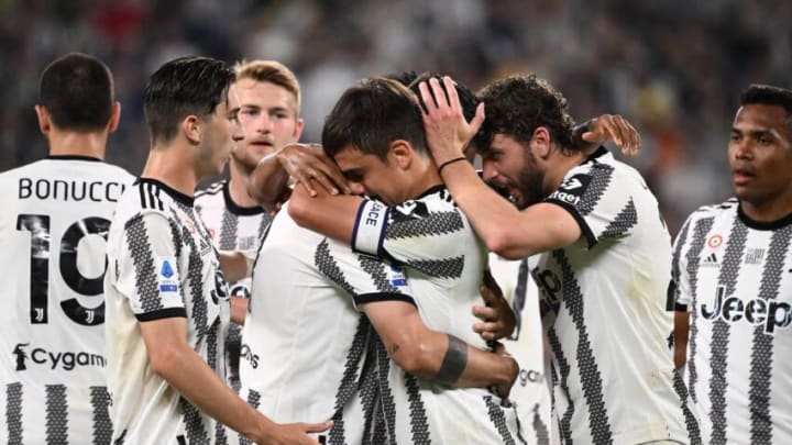 Juventus Spanish forward Alvaro Morata (L) celebrates his goal with Juventus forward Paulo Dybala from Argentina (C) during the Italian Serie A football match Juventus vs Lazio on May 16, 2022 at the Allianz Stadium in Turin. (Photo by MARCO BERTORELLO / AFP) (Photo by MARCO BERTORELLO/AFP via Getty Images)