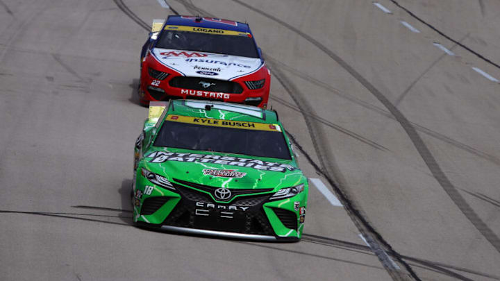 Kyle Busch, Joe Gibbs Racing, and Joey Logano, Team Penske, NASCAR (Photo by Sean Gardner/Getty Images)