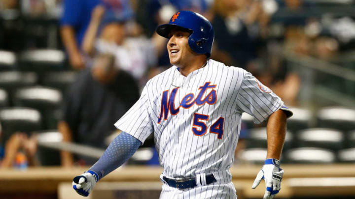 NEW YORK, NEW YORK - JULY 14: T.J. Rivera #54 of the New York Mets celebrates after hitting a solo home run in the fourth inning against the Colorado Rockies at Citi Field on July 14, 2017 in the Flushing neighborhood of the Queens borough of New York City. (Photo by Mike Stobe/Getty Images)