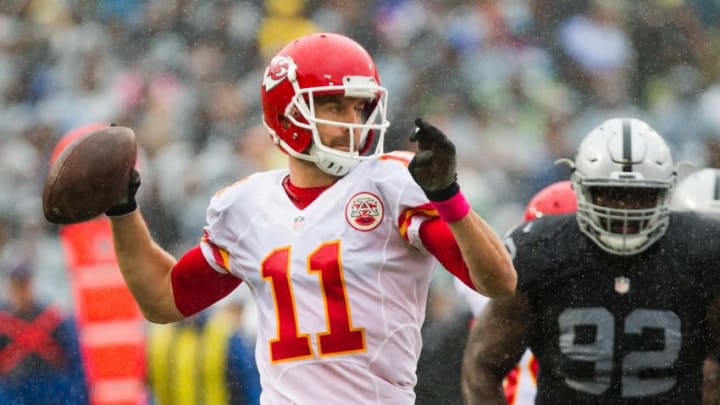 Oct 16, 2016; Oakland, CA, USA; Kansas City Chiefs quarterback Alex Smith (11) passes the ball against the Oakland Raiders during the first quarter at Oakland Coliseum. Mandatory Credit: Kelley L Cox-USA TODAY Sports