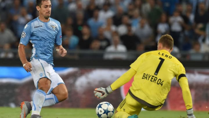 ROME, ITALY - AUGUST 18: Miroslav Klose of SS Lazio and Bernd Leno of Bayer Leverkusen in action during the UEFA Champions League qualifying round play off first leg match between SS Lazio and Bayer Leverkusen at Olimpico Stadium on August 18, 2015 in Rome, Italy. (Photo by Giuseppe Bellini/Getty Images)