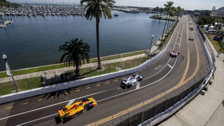 SAINT PETERSBURG, FL - MARCH 11: A pack of cars races down a tree-lined street during the Firestone Grand Prix of Saint Petersburg IndyCar race on March 11, 2018 in Saint Petersburg, Florida. (Photo by Brian Cleary/Getty Images)