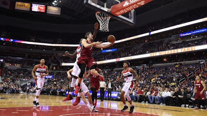 Nov 19, 2016; Washington, DC, USA; Miami Heat guard Goran Dragic (7) shoot in front of Washington Wizards forward Andrew Nicholson (44) during the first quarter at Verizon Center. Mandatory Credit: Tommy Gilligan-USA TODAY Sports