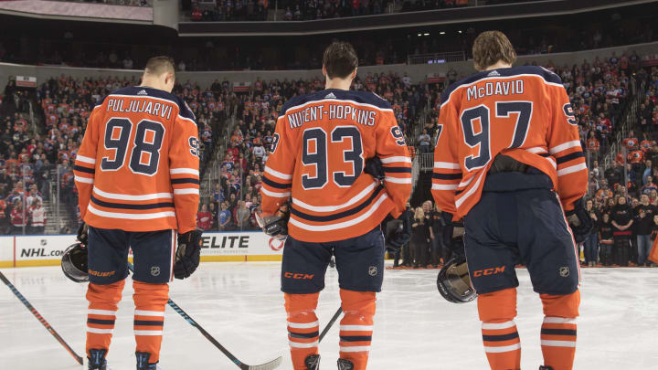 EDMONTON, AB – JANUARY 22: Jesse Puljujarvi #98, Ryan Nugent-Hopkins #93 and Connor McDavid #97 of the Edmonton Oilers skate against the Detroit Red Wings on January 22, 2019 at Rogers Place in Edmonton, Alberta, Canada. (Photo by Andy Devlin/NHLI via Getty Images)