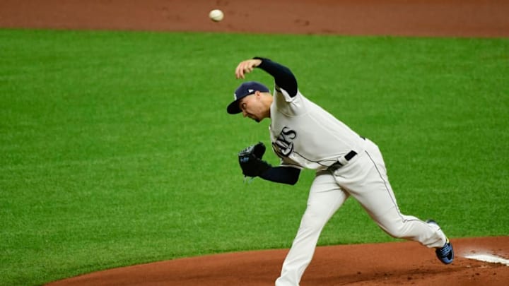 ST PETERSBURG, FLORIDA - MARCH 28: Blake Snell #4 of the Tampa Bay Rays throws the second pitch of the season to George Springer #4 of the Houston Astros During Opening Day at Tropicana Field on March 28, 2019 in St Petersburg, Florida. (Photo by Julio Aguilar/Getty Images)
