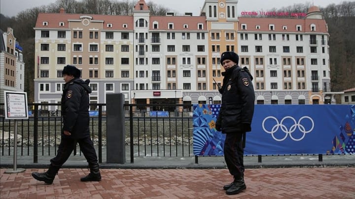 Feb 17, 2014; Krasnaya Polyana, RUSSIA; Russian police patrol in the village of Rosa Khutor at the Sochi 2014 Olympic Winter Games. Mandatory Credit: Andrew P. Scott-USA TODAY Sports