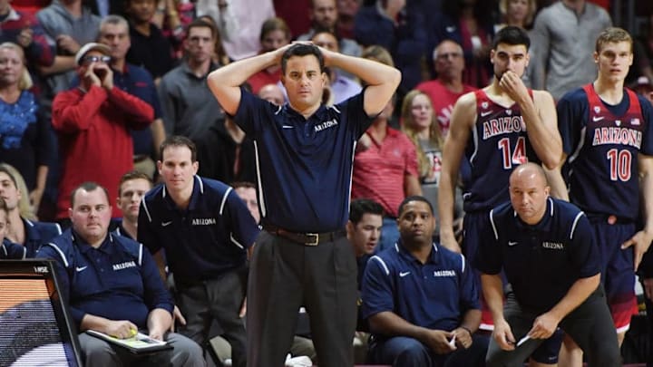 LAS VEGAS, NV - NOVEMBER 25: (L-R) Director of Basketball Operations Ryan Reynolds, associate head coach Joe Pasternack, head coach Sean Miller, assistant coaches Emanuel Richardson and Mark Phelps, Dusan Ristic