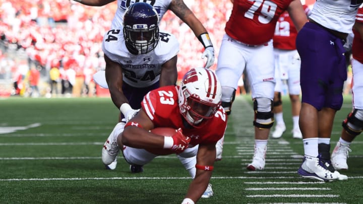 MADISON, WI - SEPTEMBER 30: Jonathan Taylor #23 of the Wisconsin Badgers dives for a touchdown during the first quarter of a game against the Northwestern Wildcats at Camp Randall Stadium on September 30, 2017 in Madison, Wisconsin. (Photo by Stacy Revere/Getty Images)