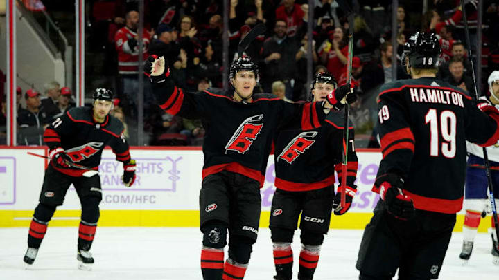 RALEIGH, NC - NOVEMBER 23: Martin Necas #88 of the Carolina Hurricanes celebrates after scoring a goal on an assist by Dougie Hamilton #19 during an NHL game against the Florida Panthers on November 23, 2019 at PNC Arena in Raleigh, North Carolina. (Photo by Gregg Forwerck/NHLI via Getty Images)
