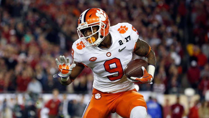 Jan 9, 2017; Tampa, FL, USA; Clemson Tigers running back Wayne Gallman (9) stiff arms against the Alabama Crimson Tide in the 2017 College Football Playoff National Championship Game at Raymond James Stadium. Mandatory Credit: Kim Klement-USA TODAY Sports