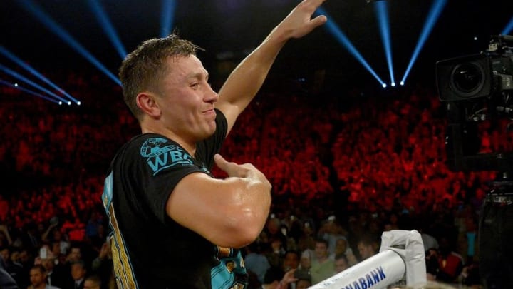 Apr 23, 2016; Los Angeles, CA, USA; Gennady Golovkin (red tape) celebrates after defeating Dominic Wade (blue tape) in their Middleweight World Championship fight at The Forum. Golovkin won by TKO in the second round. Mandatory Credit: Jayne Kamin-Oncea-USA TODAY Sports