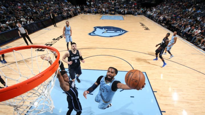 MEMPHIS, TN - MARCH 10: Mike Conley #11 of the Memphis Grizzlies shoots the ball against the Orlando Magic on March 10, 2019 at FedExForum in Memphis, Tennessee. NOTE TO USER: User expressly acknowledges and agrees that, by downloading and or using this photograph, User is consenting to the terms and conditions of the Getty Images License Agreement. Mandatory Copyright Notice: Copyright 2019 NBAE (Photo by Joe Murphy/NBAE via Getty Images)