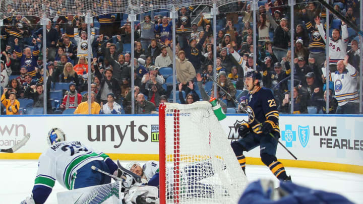 BUFFALO, NY - NOVEMBER 10: Sam Reinhart #23 of the Buffalo Sabres celebrates his late third period game tying goal against Jacob Markstrom #25 of the Vancouver Canucks during an NHL game on November 10, 2018 at KeyBank Center in Buffalo, New York. Buffalo won, 4-3 in a shoot out.(Photo by Sara Schmidle/NHLI via Getty Images)