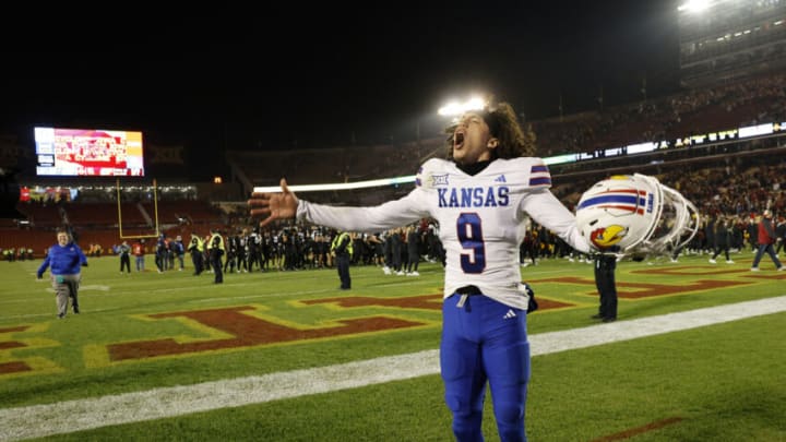 AMES, IA - NOVEMBER 4: Quarterback Jason Bean #9 of the Kansas Jayhawks celebrates after winning 28-21 over the Iowa State Cyclones at Jack Trice Stadium on November 4, 2023 in Ames, Iowa. The Kansas Jayhawks won 28-21 over the Iowa State Cyclones. (Photo by David Purdy/Getty Images)