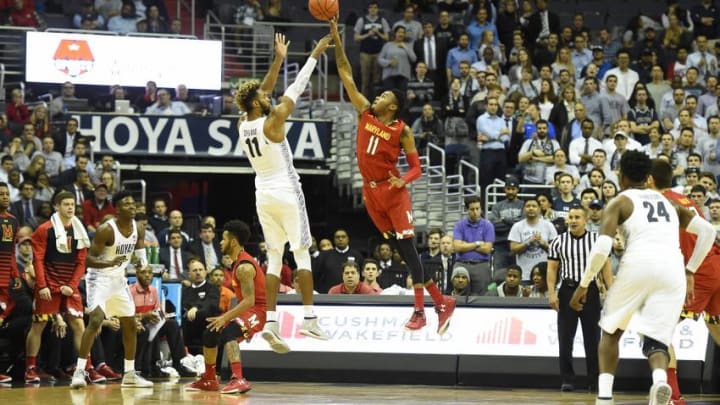 Nov 15, 2016; Washington, DC, USA; Maryland Terrapins guard Jared Nickens (11) blocks Georgetown Hoyas forward Isaac Copeland (11) shot attempt during the first half at Verizon Center. Mandatory Credit: Tommy Gilligan-USA TODAY Sports