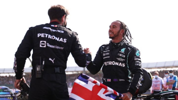 NORTHAMPTON, ENGLAND - JULY 18: Race winner Lewis Hamilton of Great Britain and Mercedes GP celebrates in parc ferme during the F1 Grand Prix of Great Britain at Silverstone on July 18, 2021 in Northampton, England. (Photo by Lars Baron/Getty Images)