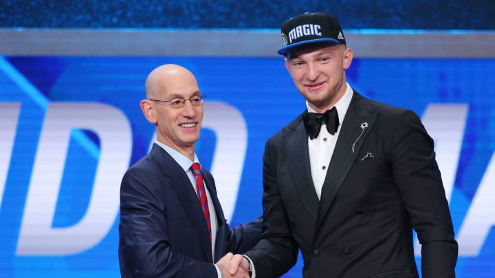 Jun 23, 2016; New York, NY, USA; Domantas Sabonis (Gonzaga) greets NBA commissioner Adam Silver after being selected as the number eleven overall pick to the Orlando Magic in the first round of the 2016 NBA Draft at Barclays Center. Mandatory Credit: Brad Penner-USA TODAY Sports
