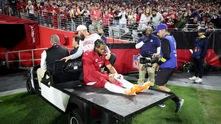 GLENDALE, ARIZONA - DECEMBER 12: Kyler Murray #1 of the Arizona Cardinals is carted off the field after being injured against the New England Patriots during the first quarter of the game at State Farm Stadium on December 12, 2022 in Glendale, Arizona. (Photo by Christian Petersen/Getty Images)