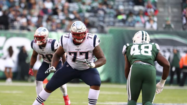 EAST RUTHERFORD, NEW JERSEY - NOVEMBER 25: Trent Brown #77 of the New England Patriots in action against the New York Jets during their game at MetLife Stadium on November 25, 2018 in East Rutherford, New Jersey. (Photo by Al Bello/Getty Images)