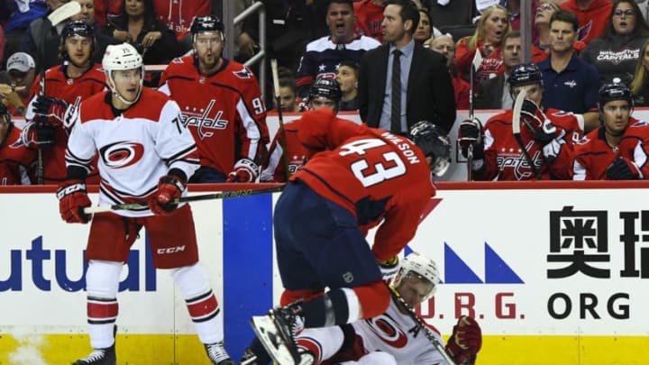 WASHINGTON, DC - APRIL 11: Washington Capitals right wing Tom Wilson (43) hits Carolina Hurricanes center Jordan Staal (11) in the first period on April 11, 2019, at the Capital One Arena in Washington, D.C. in the first round of the Stanley Cup Playoffs. (Photo by Mark Goldman/Icon Sportswire via Getty Images)