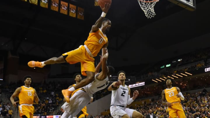 COLUMBIA, MISSOURI - JANUARY 08: Jordan Bone #0 of the Tennessee Volunteers draws a foul against Xavier Pinson #1 of the Missouri Tigers as he goes up for a basket in the first half at Mizzou Arena on January 08, 2019 in Columbia, Missouri. (Photo by Ed Zurga/Getty Images)
