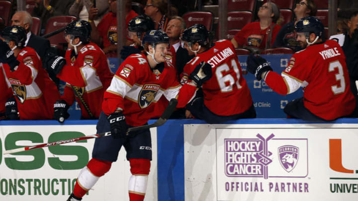 SUNRISE, FL - SEPT. 26: Owen Tippett #74 of the Florida Panthers celebrates his goal with teammates against the Tampa Bay Lightning at the BB&T Center on September 26, 2019 in Sunrise, Florida. (Photo by Eliot J. Schechter/NHLI via Getty Images)