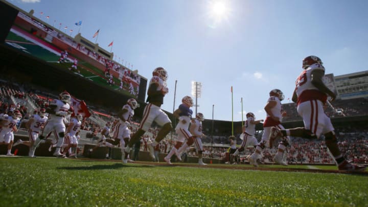 NORMAN, OK - APRIL 24: The Oklahoma Sooners run onto the field for their spring game at Gaylord Family Oklahoma Memorial Stadium on April 24, 2021 in Norman, Oklahoma. (Photo by Brian Bahr/Getty Images)