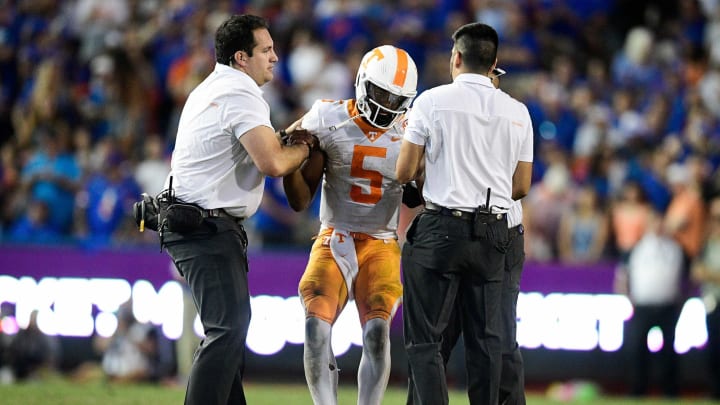 Tennessee quarterback Hendon Hooker (5) is injured during a game at Ben Hill Griffin Stadium in Gainesville, Fla. on Saturday, Sept. 25, 2021.Kns Tennessee Florida Football