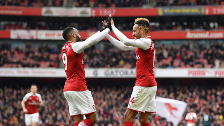 LONDON, ENGLAND - APRIL 01: Pierre-Emerick Aubameyang of Arsenal celebrates after scoring his sides second goal with Alexandre Lacazette of Arsenal during the Premier League match between Arsenal and Stoke City at Emirates Stadium on April 1, 2018 in London, England. (Photo by Shaun Botterill/Getty Images)