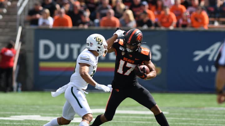 CORVALLIS, OR - SEPTEMBER 14: Oregon State Beavers WR Isaiah Hodgins (17) runs after the catch against Cal Poly Mustangs DB Sharky Reza (20) during a college football game between the Cal Poly Mustangs and Oregon State Beavers at Reser Stadium in Corvallis, Oregon. (Photo by Brian Murphy/Icon Sportswire via Getty Images)