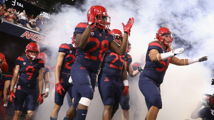 TUCSON, AZ – NOVEMBER 11: Running back Nick Wilson #28 of the Arizona Wildcats runs onto the field with teammates before the college football game against the Oregon State Beavers at Arizona Stadium on November 11, 2017 in Tucson, Arizona. (Photo by Christian Petersen/Getty Images)