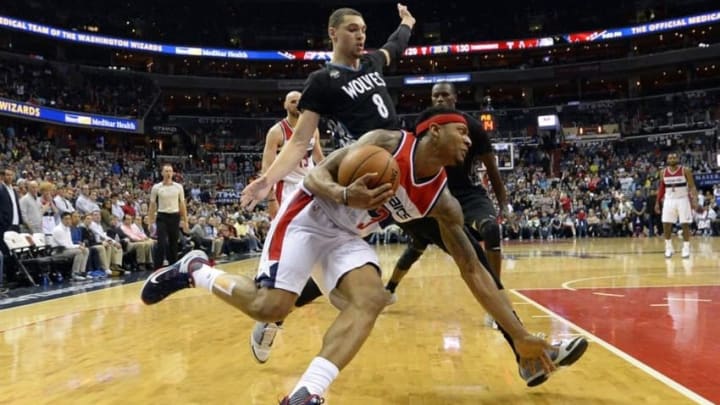 Mar 25, 2016; Washington, DC, USA; Washington Wizards guard Bradley Beal (3) drives to the basket as Minnesota Timberwolves guard Zach LaVine (8) defends during overtime at Verizon Center. Minnesota Timberwolves defeated Washington Wizards 132-129 in double overtime. Mandatory Credit: Tommy Gilligan-USA TODAY Sports