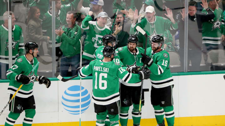 DALLAS, TEXAS – JANUARY 27: Jamie Benn #14 of the Dallas Stars celebrates after scoring the game winning goal against Andrei Vasilevskiy #88 of the Tampa Bay Lightning in the first overtime period at American Airlines Center on January 27, 2020 in Dallas, Texas. (Photo by Tom Pennington/Getty Images)
