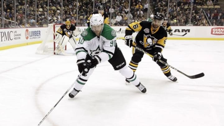 Dec 1, 2016; Pittsburgh, PA, USA; Dallas Stars center Jason Spezza (90) reaches for the puck ahead of Pittsburgh Penguins defenseman Trevor Daley (6) during the first period at the PPG PAINTS Arena. Mandatory Credit: Charles LeClaire-USA TODAY Sports